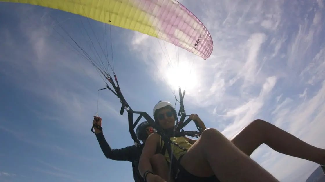 Paraglider wing above Montenegro illustrating how flying changes place perspective