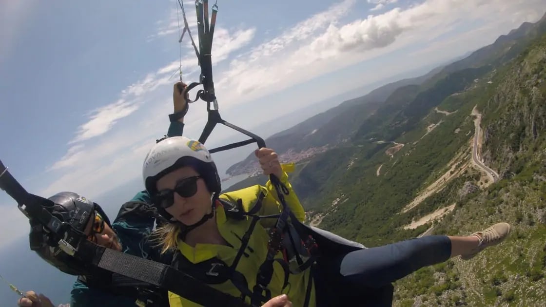 Tandem paragliding above the Montenegro coast as a scenic comparison opener for Petrovac and Bar