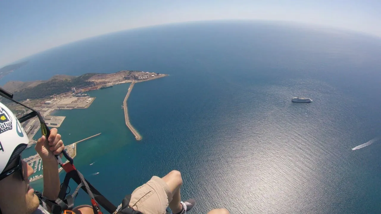 High paragliding view over the Adriatic bay near Bar and Sutomore